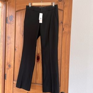 New with tags.  Banana Republic size 4 petite black Logan light wool trousers.